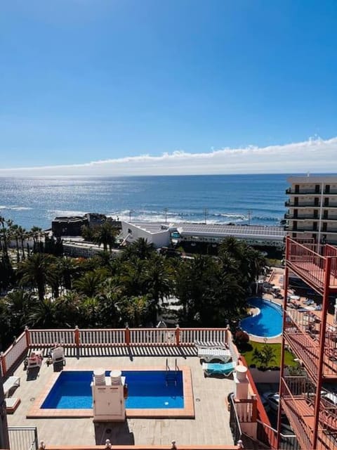Property building, Natural landscape, View (from property/room), Balcony/Terrace, Beach, Pool view, Sea view, Swimming pool