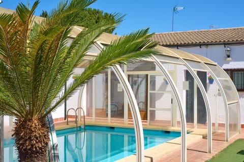 Property building, Living room, Swimming pool