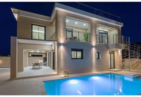 Property building, Living room, Swimming pool