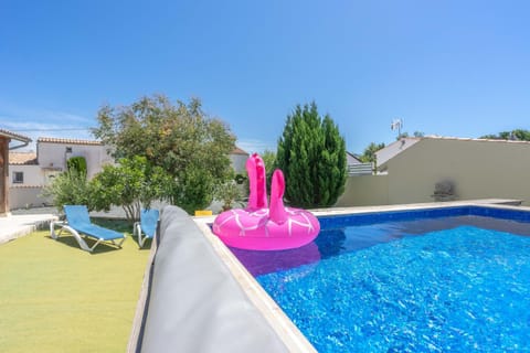 Property building, Living room, Swimming pool