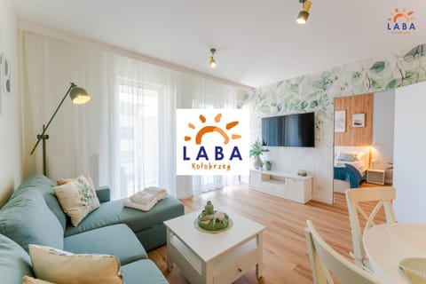 Property logo or sign, TV and multimedia, Living room, Seating area