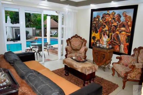 Communal lounge/ TV room, Living room, Seating area, Pool view, Swimming pool