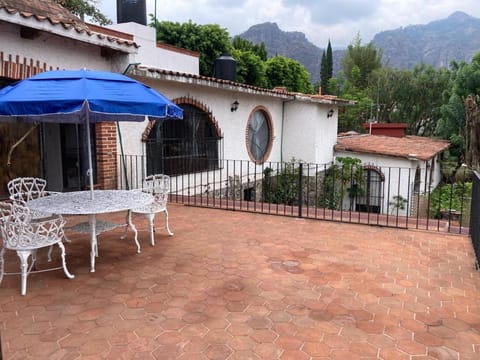 Property building, Patio, Spring, Day, Natural landscape, View (from property/room), Balcony/Terrace, Dining area, Mountain view