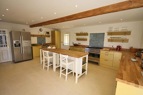 Kitchen or kitchenette, dishwasher, oven, stove
