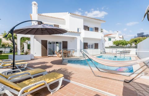 Property building, Living room, Swimming pool