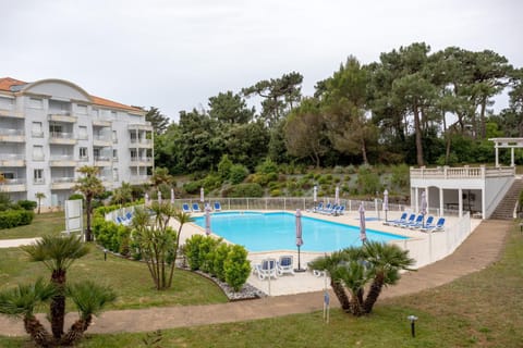 Property building, Living room, Swimming pool