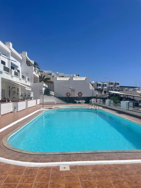 Property building, Day, Natural landscape, Solarium, Pool view, Swimming pool, sunbed