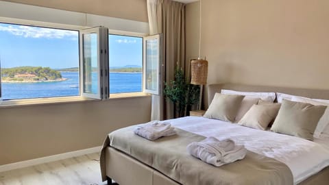 Bed, Natural landscape, Bedroom, Sea view, towels