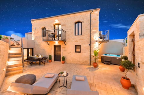 Property building, Patio, Night, View (from property/room), Balcony/Terrace, Living room, Seating area