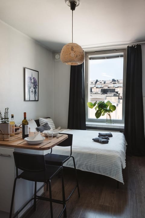 Bed, Living room, Seating area, Dining area