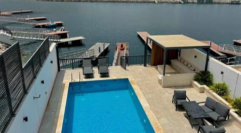 Property building, Patio, Day, Natural landscape, Activities, View (from property/room), Balcony/Terrace, Lake view, Pool view, River view, River view, Sea view, Sea view, Swimming pool, sunbed