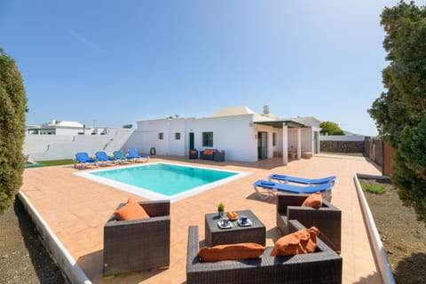 Property building, Living room, Swimming pool