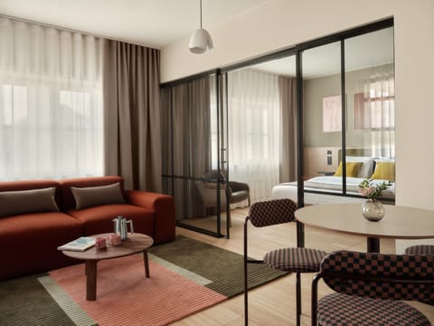 Bed, Living room, Seating area, Bedroom