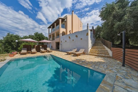 Property building, Living room, Swimming pool