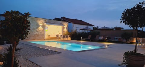 Property building, Night, Pool view, Swimming pool, sunbed