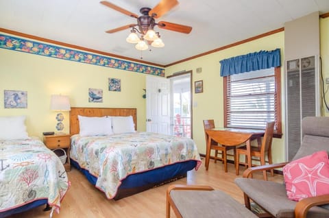 The Pelican Hidden Treasure Inn Room 2 by Bryant Real Estate Inn in Kure Beach