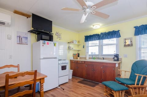 The Gull Hidden Treasure Inn Room 1 by Bryant Real Estate Inn in Kure Beach