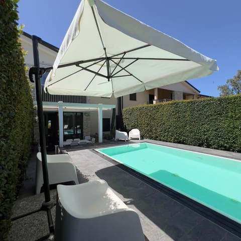 Patio, Day, Pool view, Swimming pool, sunbed