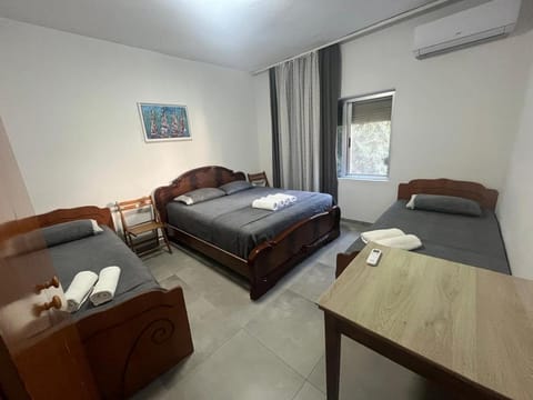 Bed, Photo of the whole room, Bedroom, Family, towels, air conditioner