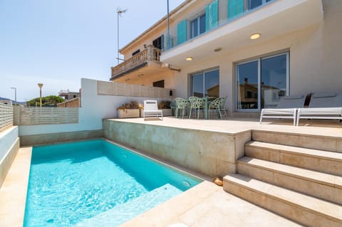Property building, Living room, Swimming pool