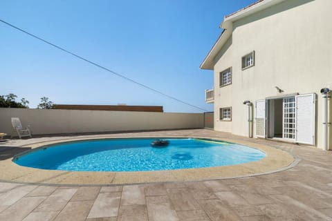 Property building, Living room, Swimming pool