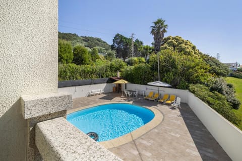 Property building, Living room, Swimming pool