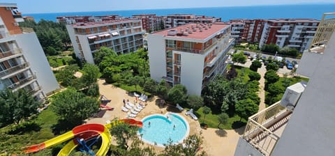 Property building, Natural landscape, Bird's eye view, Children play ground, Aqua park, Pool view, Swimming pool, sunbed