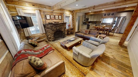 TV and multimedia, Kitchen or kitchenette, Living room, Seating area, fireplace, furniture, kitchen