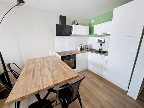 Dining area, dishwasher, oven, stove