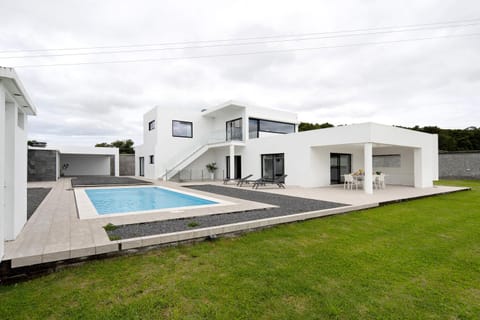 Property building, Living room, Swimming pool