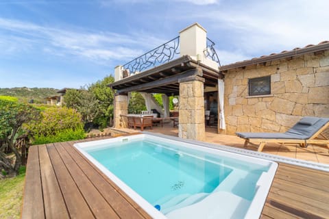 Property building, Patio, Natural landscape, Pool view, Swimming pool, sunbed