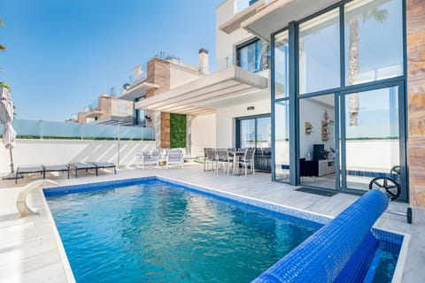 Property building, Living room, Swimming pool