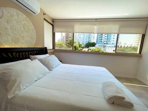 Bed, Photo of the whole room, Bedroom, City view, towels, air conditioner