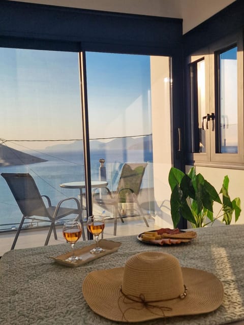 Natural landscape, View (from property/room), Balcony/Terrace, Food and drinks, Seating area, Sea view