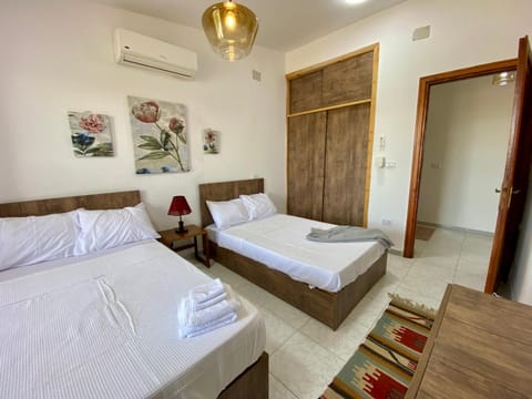 Photo of the whole room, air conditioner