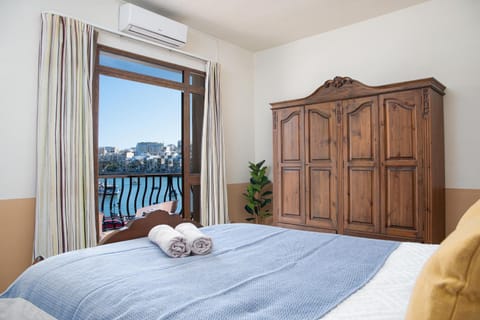 Bed, Natural landscape, Bedroom, Sea view, Bath, towels, air conditioner