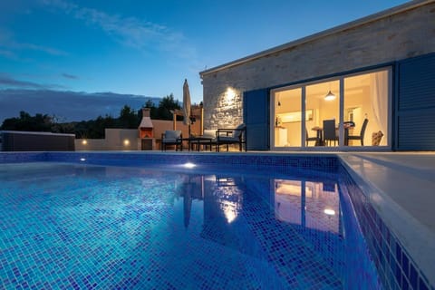Patio, Night, Pool view, Swimming pool, sunbed