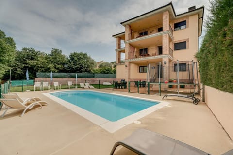 Property building, Living room, Swimming pool