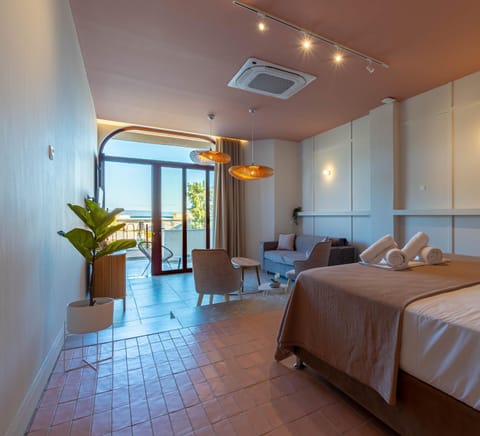 Bed, Living room, Seating area, Bedroom, towels, towels, air conditioner, air conditioner