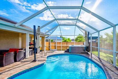 Patio, Day, Natural landscape, Pool view, Swimming pool, sunbed