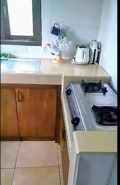 Kitchen or kitchenette, stove, toaster