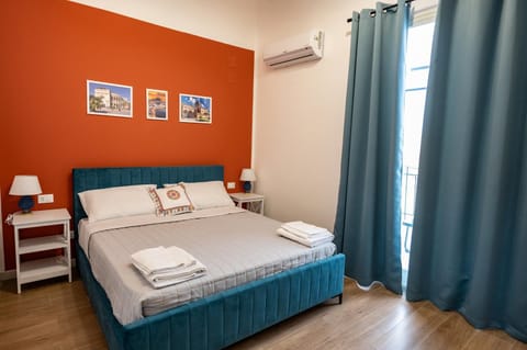 Bed, Photo of the whole room, Bedroom, towels, air conditioner