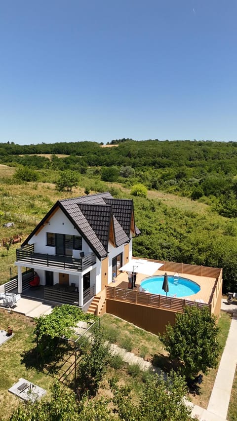 Property building, Day, Natural landscape, Pool view, Swimming pool, sunbed