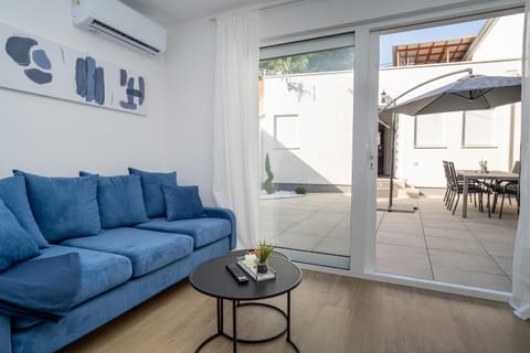 View (from property/room), Living room, Seating area, air conditioner