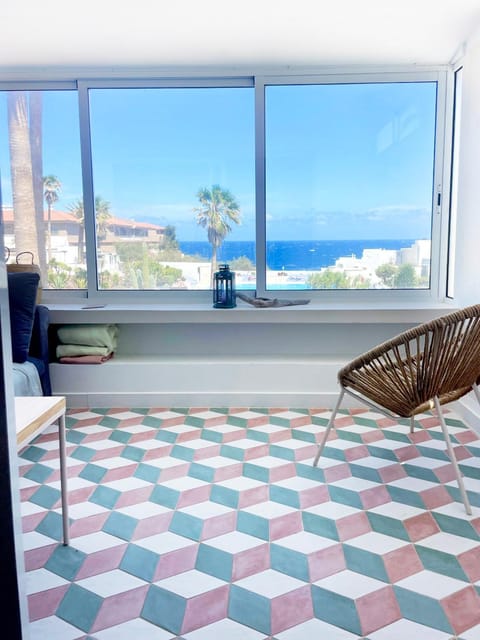 View (from property/room), Living room, Seating area, Sea view
