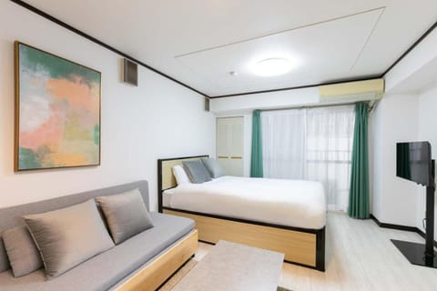 Bed, TV and multimedia, Living room, Seating area