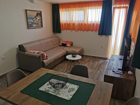 Property building, TV and multimedia, Living room, Seating area, Dining area