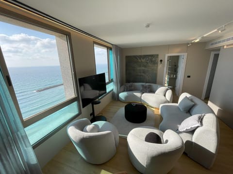 View (from property/room), Living room, Seating area, Sea view