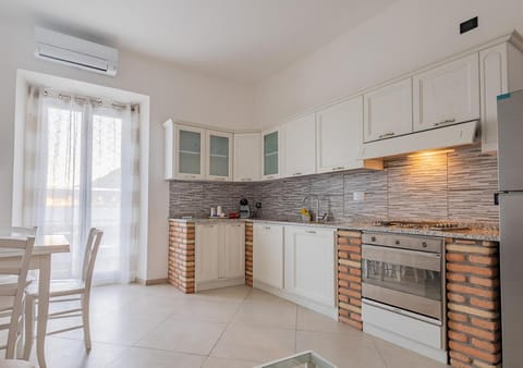 Kitchen or kitchenette, oven, stove