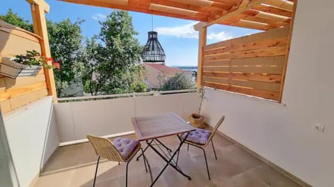 Property building, Patio, Day, View (from property/room), Balcony/Terrace, Balcony/Terrace, Dining area